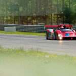 trackday-marco-werner-im-Ferrari-333-SP-curbs-historischer-motorsport